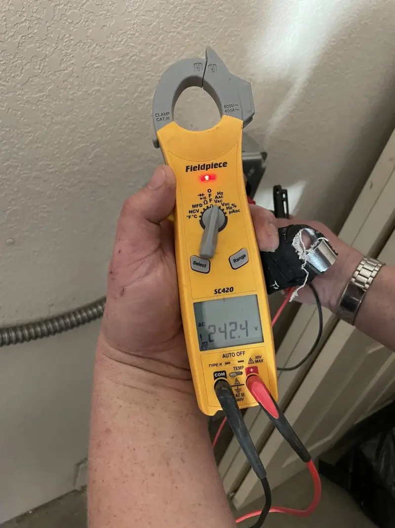 Voltage testing with clamp meter during Generator Installation in Pasadena Hills